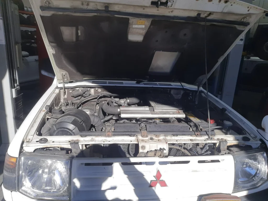 Mitsubishi diesel engine showing signs of wear before a full rebuild