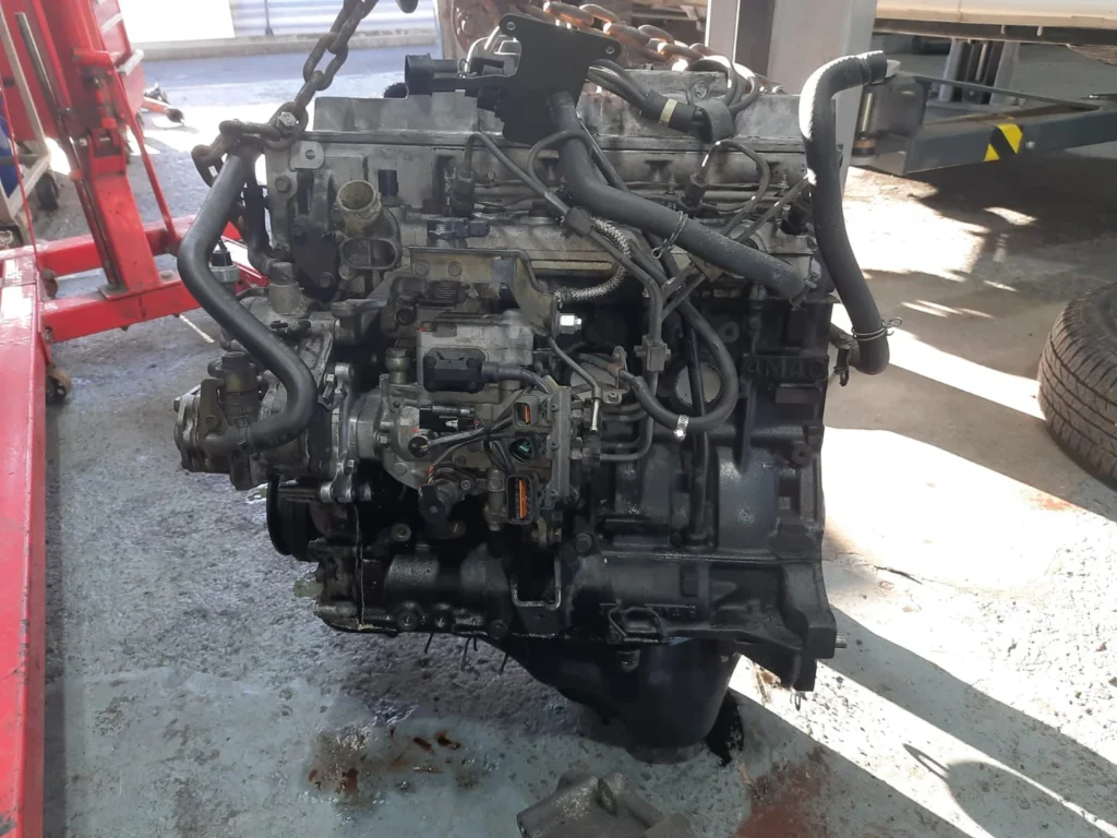 Mitsubishi diesel engine being dismantled for inspection and rebuilding